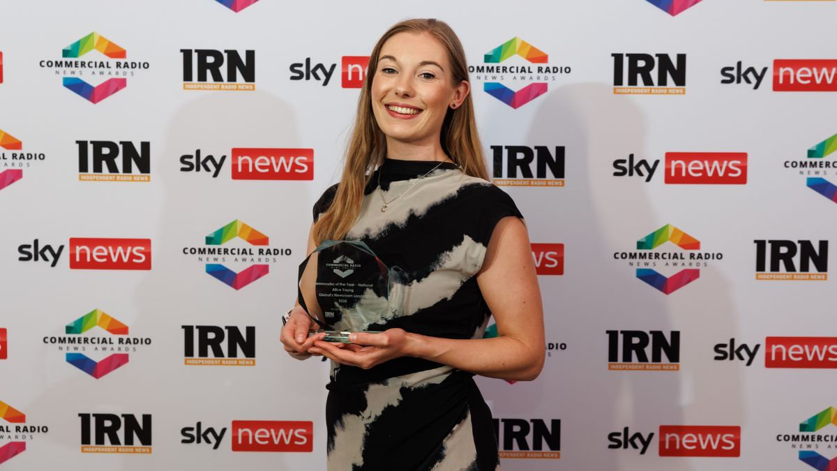 A picture of Alice Young holding her National Newsreader of the Year Award
