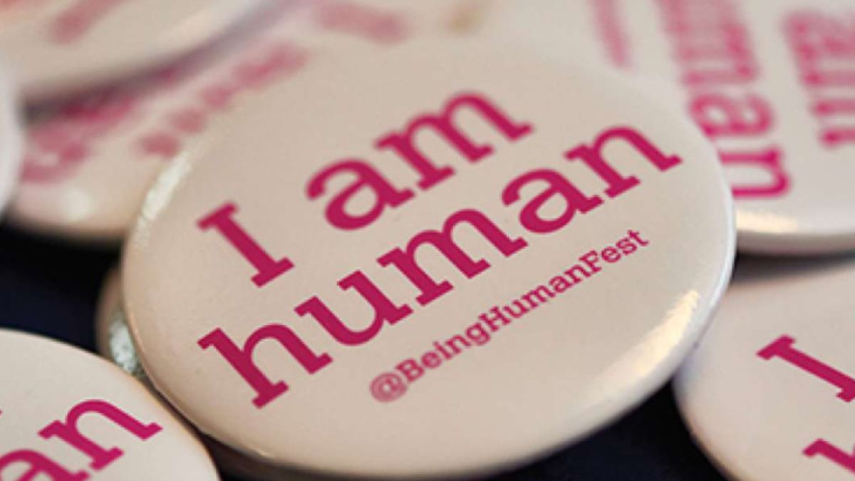 A badge with the words I am human
