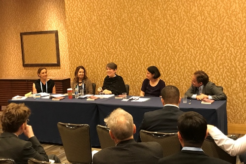 Professor Reverend Jane de Gay sits on a panel at the American Academy of Religion conference.